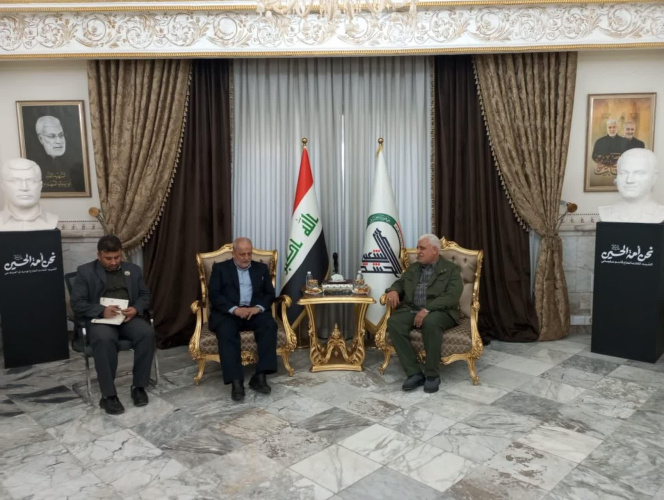 The meeting between the President of the Supreme National Defense University and the head of the Hashd al-Shaabi Board